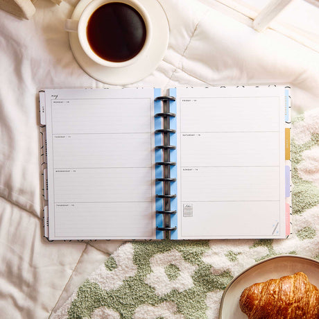 Happy Planner Pajama Plans Classic Horizontal Planner 2027: Weekly writing spaces beside coffee and a croissant