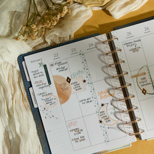 Starlit Glow planner open with handwritten plans and colourful accents