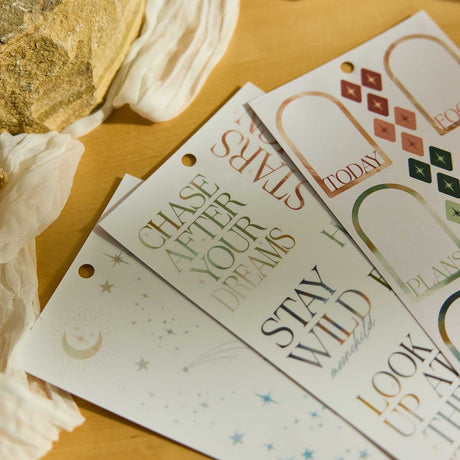 Starlit Glow stickers with celestial stars and motivational phrases