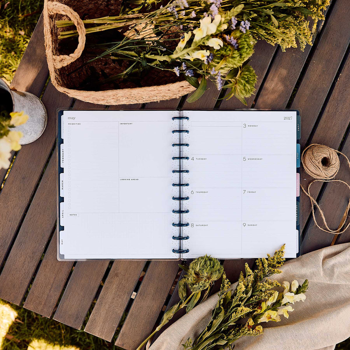 Wildflower Daydream Big weekly dashboard spread surrounded by dried flowers on a wooden table