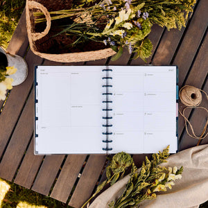 Wildflower Daydream Big weekly dashboard spread surrounded by dried flowers on a wooden table
