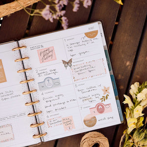 Wildflower Daydream Faith Planner open with weekly faith notes and floral artwork