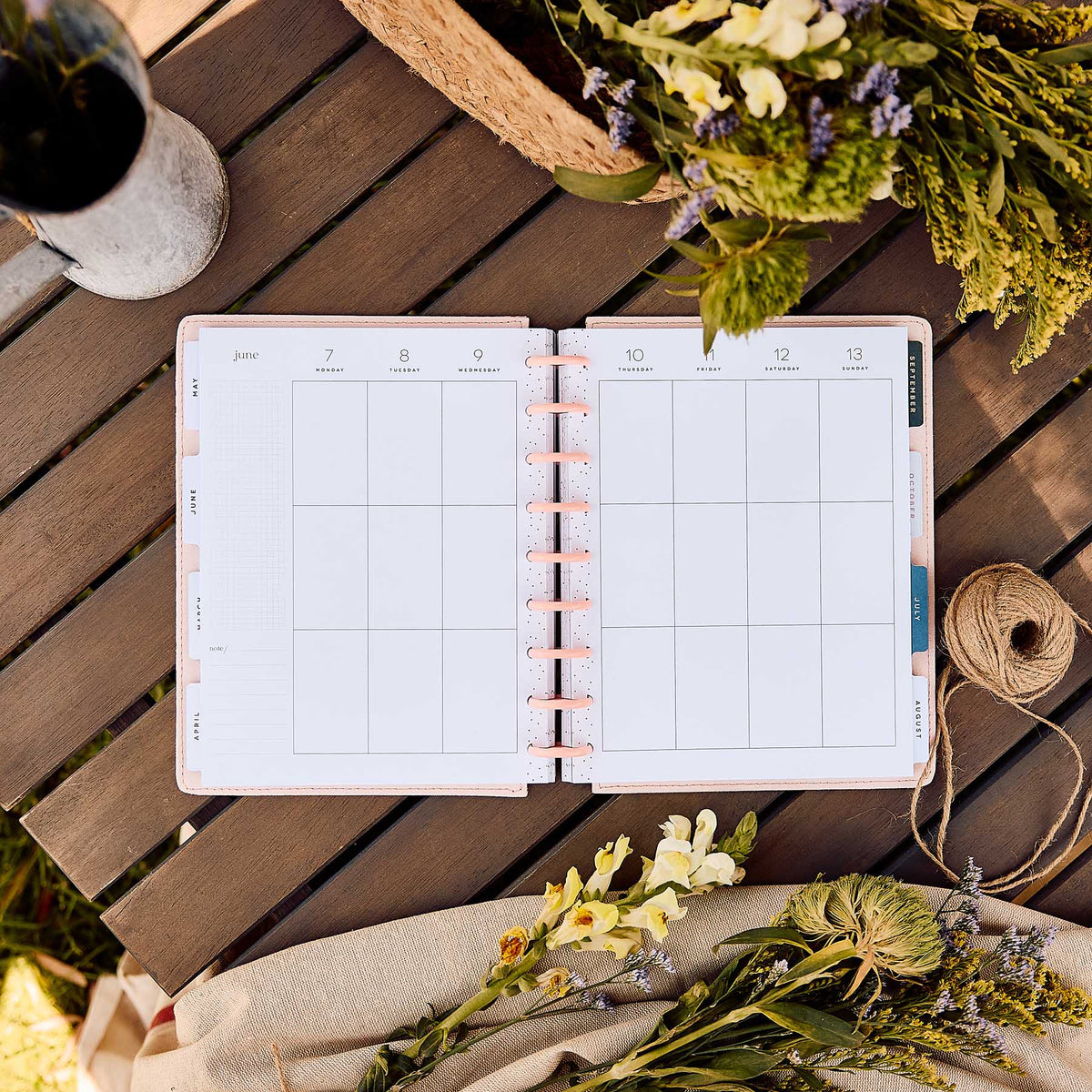 Wildflower Daydream monthly calendar beside floral decor and twine