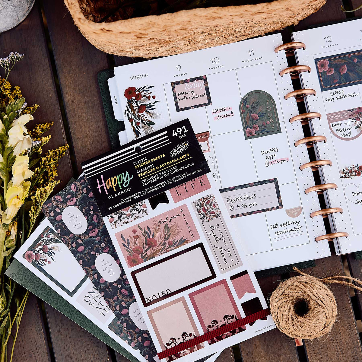 Twilight Tapestry floral stickers on an open disc-bound planner with vintage-inspired designs