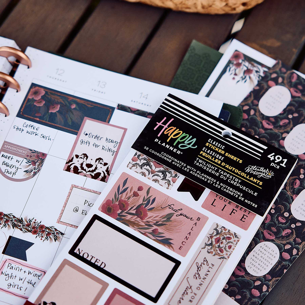 Twilight Tapestry floral labels and decorative stickers displayed on an open planner
