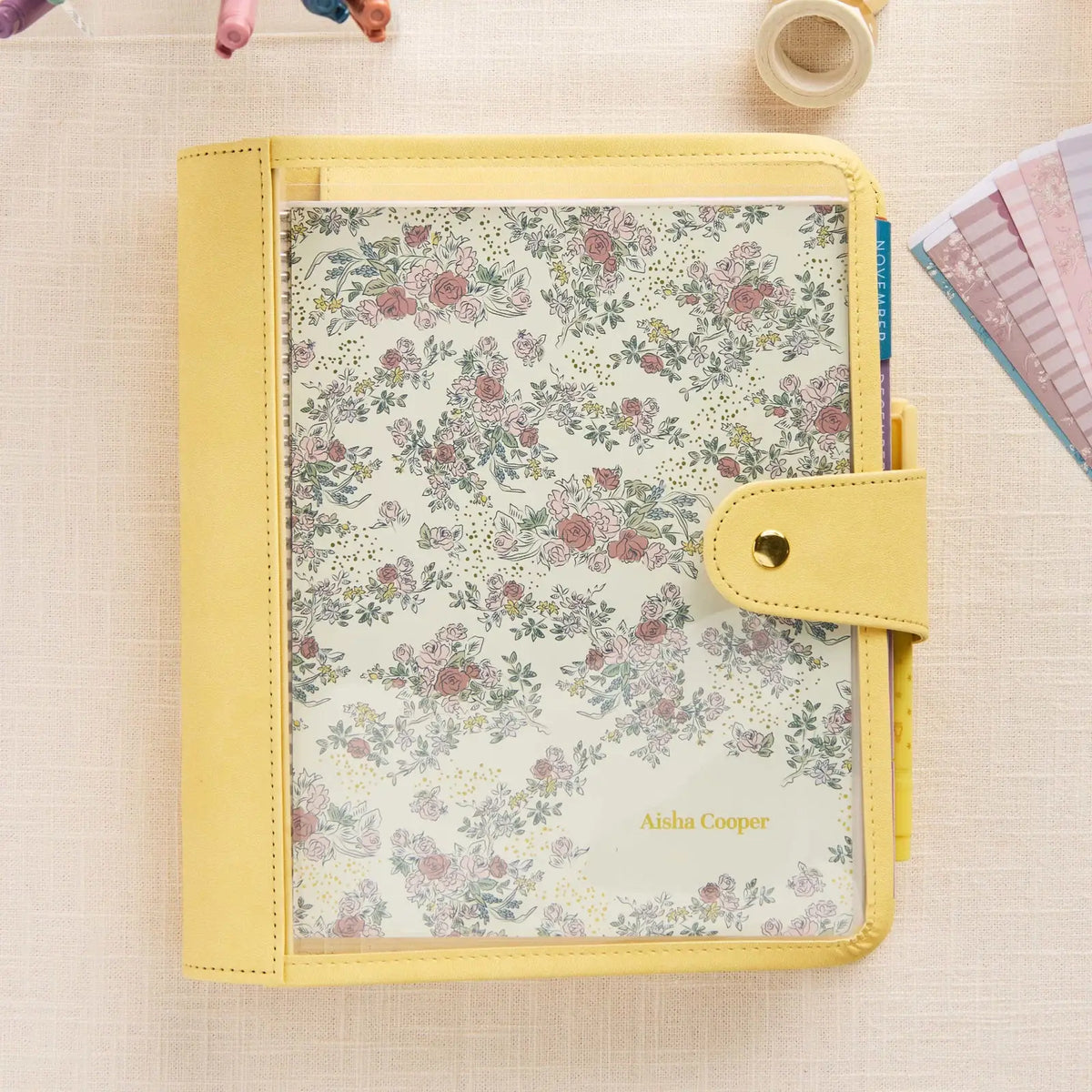 Erin Condren planner folio: Butter folio holding a floral cover planner