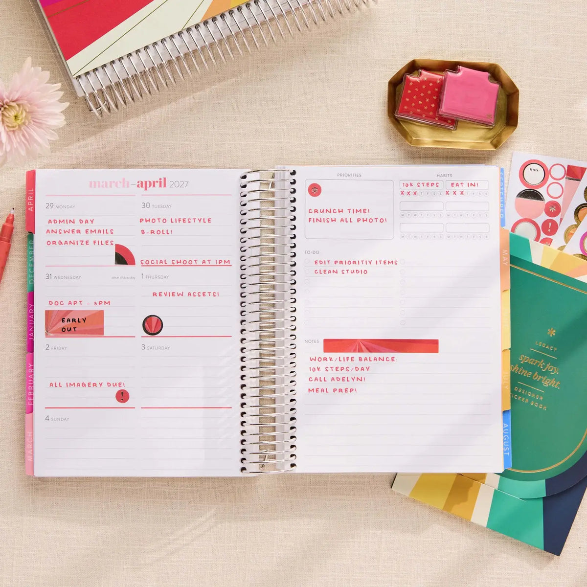 Erin Condren sticker book: Stickers used to highlight plans on a weekly spread