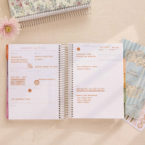 Erin Condren sticker book: Toile planning stickers used on a weekly spread beside the sticker book