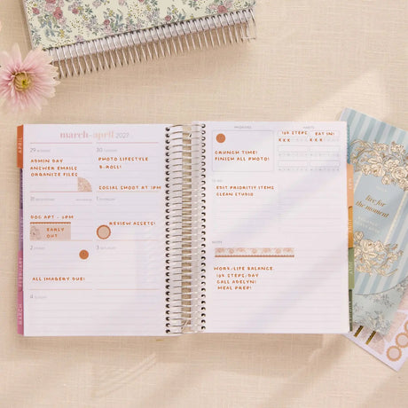Erin Condren sticker book: Toile planning stickers used on a weekly spread beside the sticker book