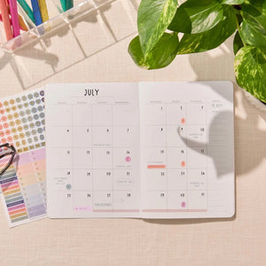 Erin Condren Petite Planner: Monthly calendar with handwritten dates