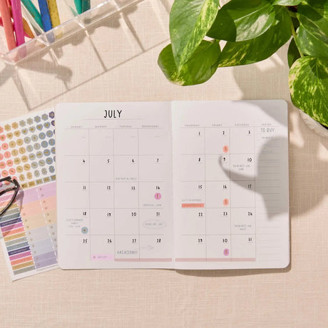 Erin Condren Petite Planner: Monthly calendar with handwritten dates
