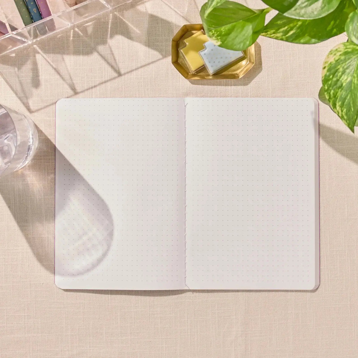 Erin Condren Petite Journal: Open dot grid Petite Journal on a desk