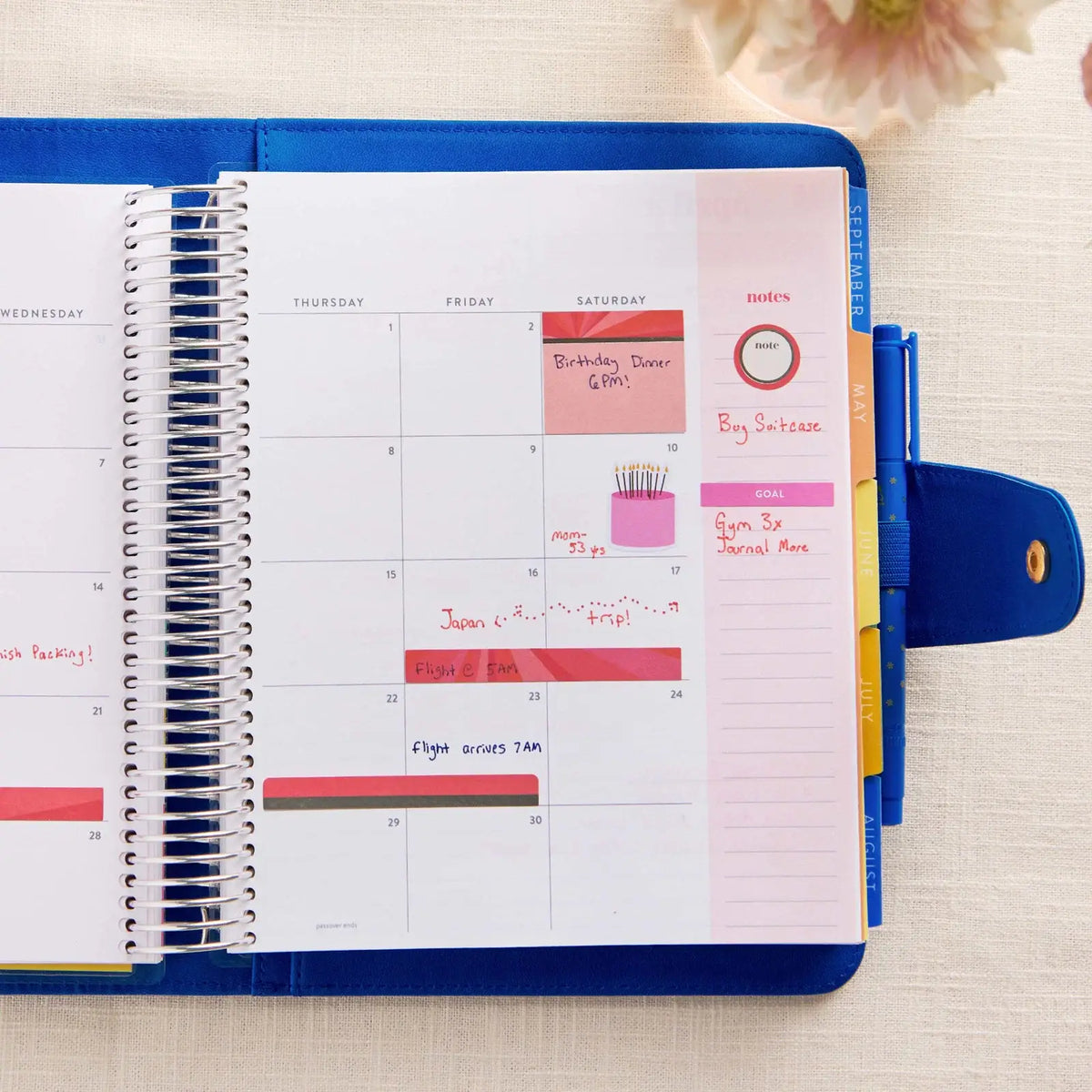 Erin Condren planner folio: Open folio holding a planner on a weekly spread