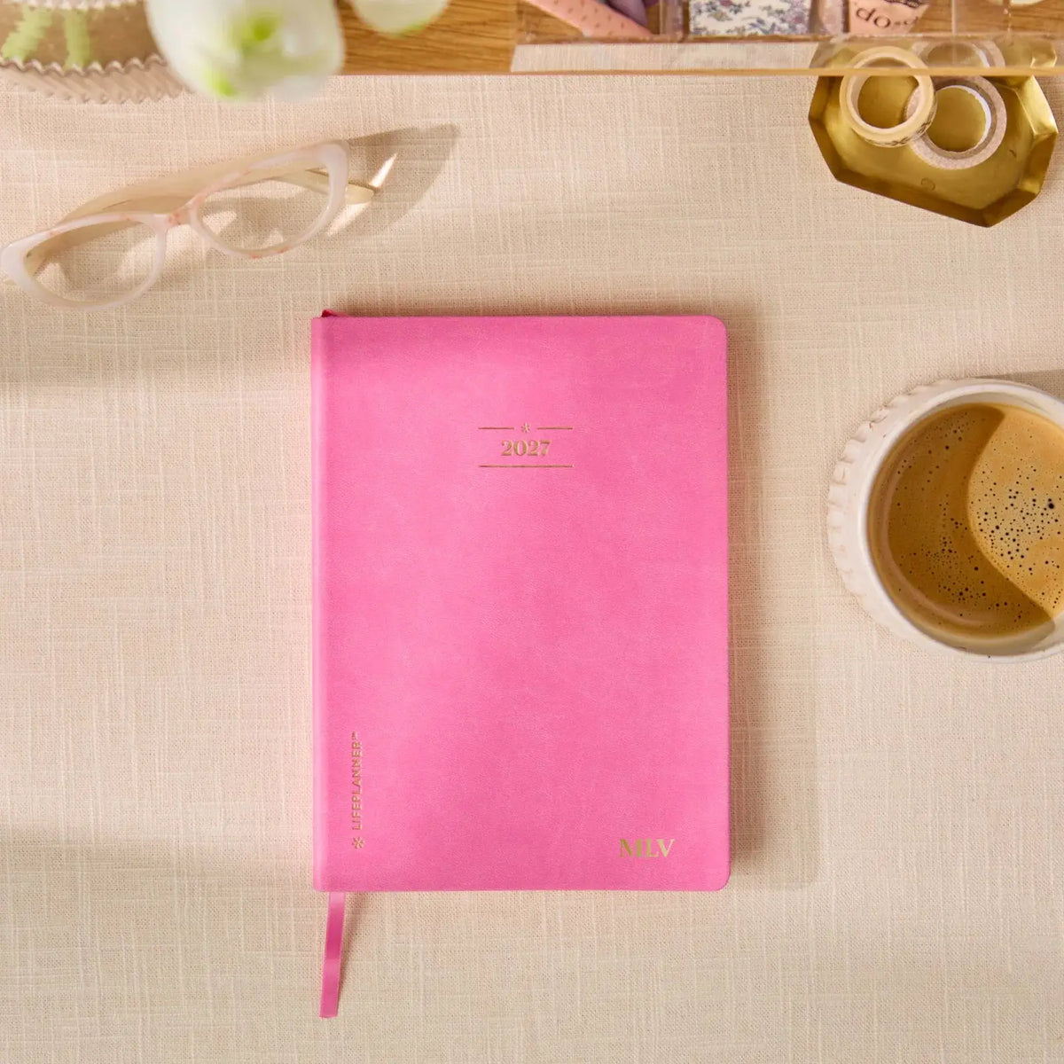Erin Condren LifePlanner: Closed Candy pink Softbound LifePlanner on a desk