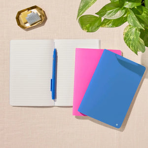 Erin Condren Petite Journal: Open journal beside Royal Blue and pink covers
