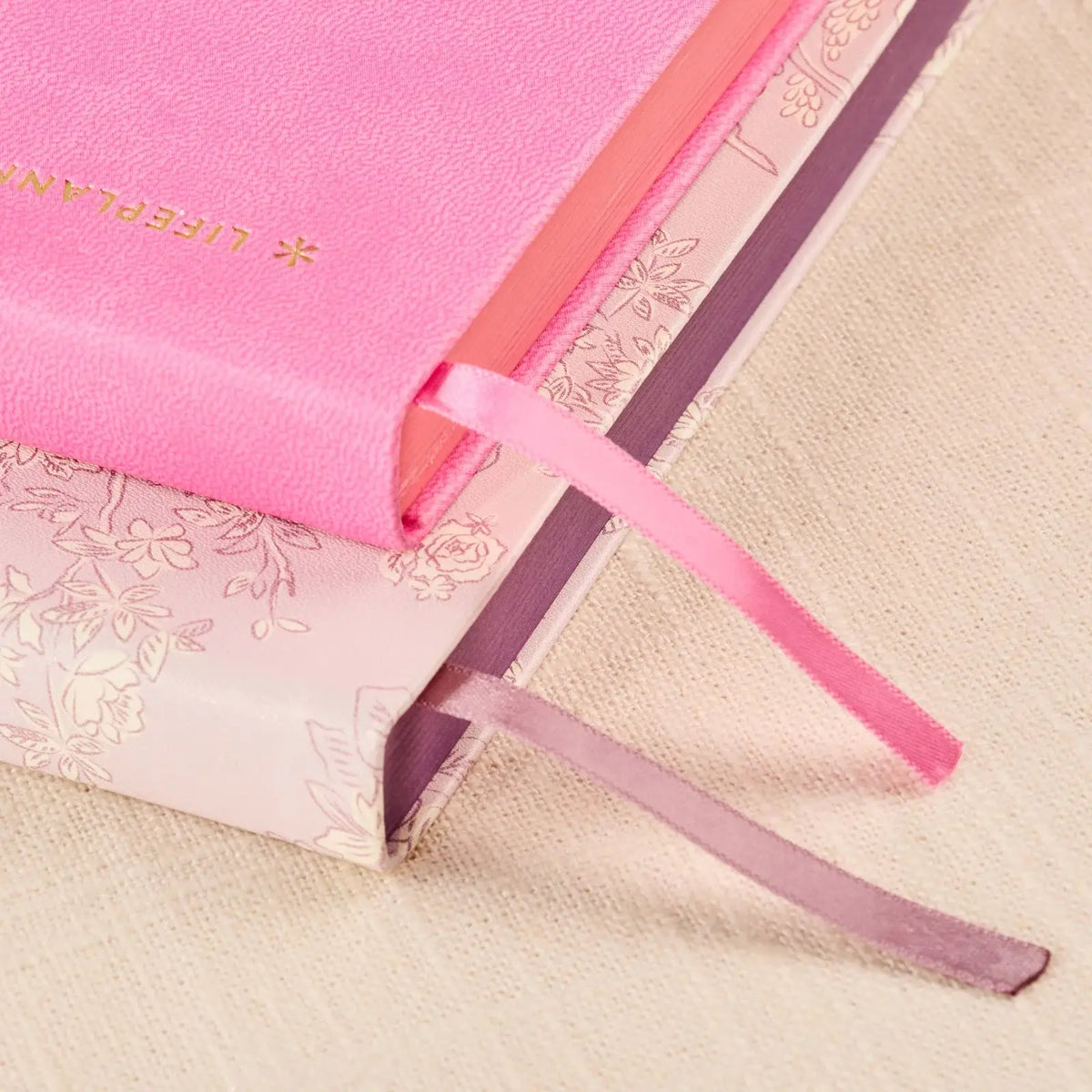 Erin Condren LifePlanner: Close-up of Candy pink cover edges and ribbon bookmarks