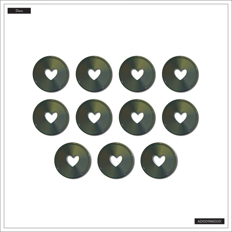 Twelve compact discs with heart cutouts arranged in a grid on a white background.