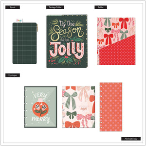 Collection of Christmas-themed stationery items including folders and an envelope.