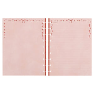 Pink Happy Planner refill paper with red ribbon and decorative elements on a white background