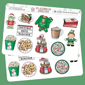 Christmas Movies Deluxe Decorative Planner Sticker sheet with Christmas-themed illustrations, including cookies, hot chocolate, and an elf on a green background.