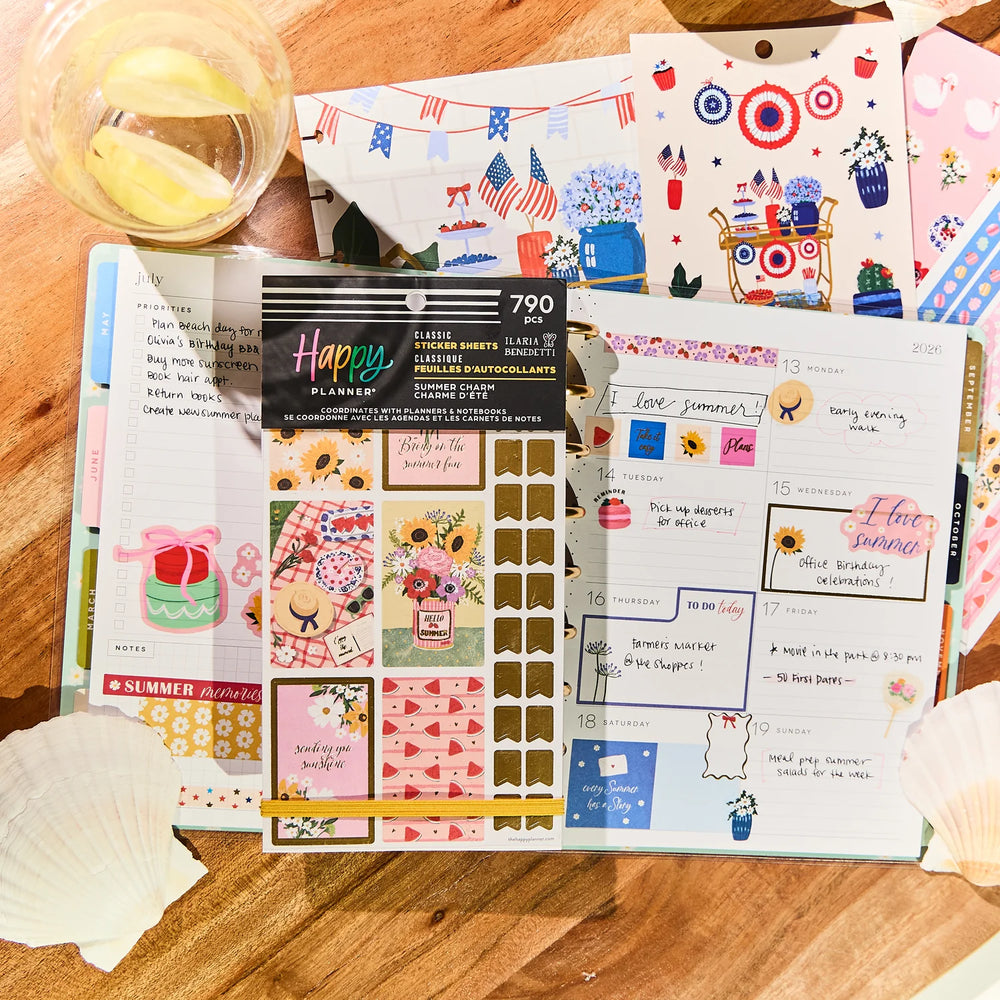 Happy Planner Summer Charm Classic Sticker Book with various stickers on a wooden surface