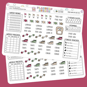 Christmas Cafe Fitness Planner Stickers  with fitness and lifestyle tracking elements on a pink background.