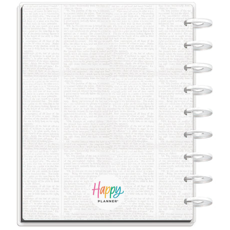 Happy Planner notebook with spiral binding on a white background
