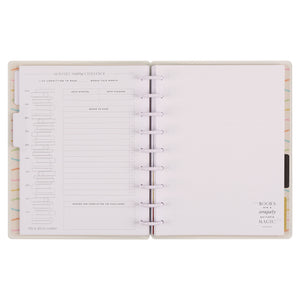 Open planner with colorful design on a white background