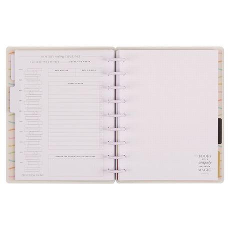 Open planner with colorful design on a white background