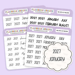 2027 Month & Year Planner Stickers sheets from Planners Avenue featuring the year 2027 in black script on white labels with lavender headers. A cloud-shaped sticker reading '2027 January' is shown in front.