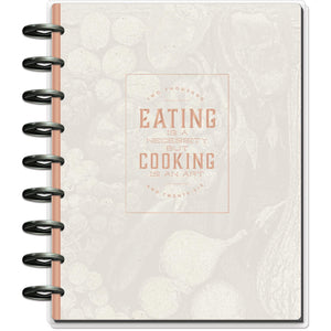 Notebook with decorative cover and spiral binding on a white background
