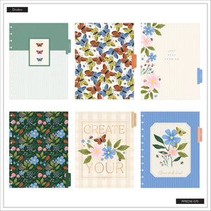 Collection of stationery items with floral and butterfly designs on a white background