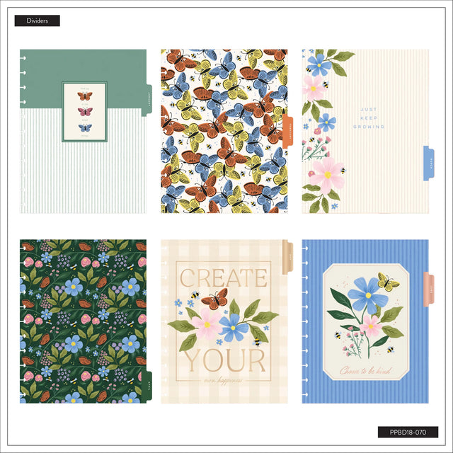 Collection of stationery items with floral and butterfly designs on a white background