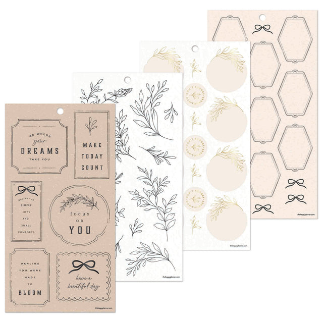 Collection of decorative stickers with motivational phrases and floral designs on a white background.