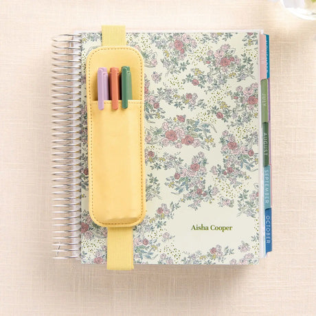 Erin Condren pen holder: Butter pen holder attached to a floral planner with pens