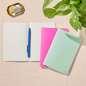 Erin Condren Petite Journal: Lined journal beside Candy pink and Pool journals