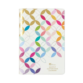 Erin Condren Monthly Petite Planner - Undated. Colourful circular-patterned calendar on a white background.