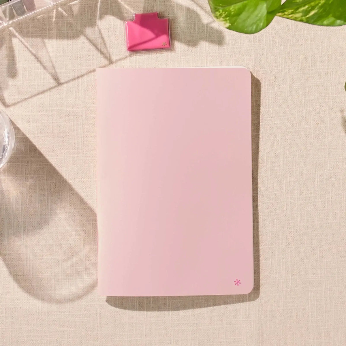Erin Condren Petite Journal: Closed blush journal showing its plain cover