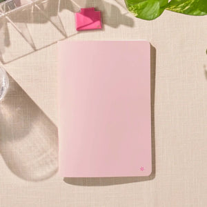 Erin Condren Petite Journal: Closed blush journal showing its plain cover