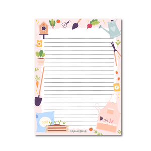 Green Thumb Delights A5 Notepad border has gardening tools, vegetables, watering can, soil and planters